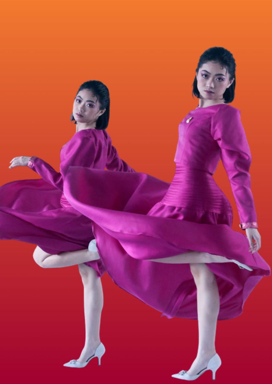 Two fuchsia gowns in motion