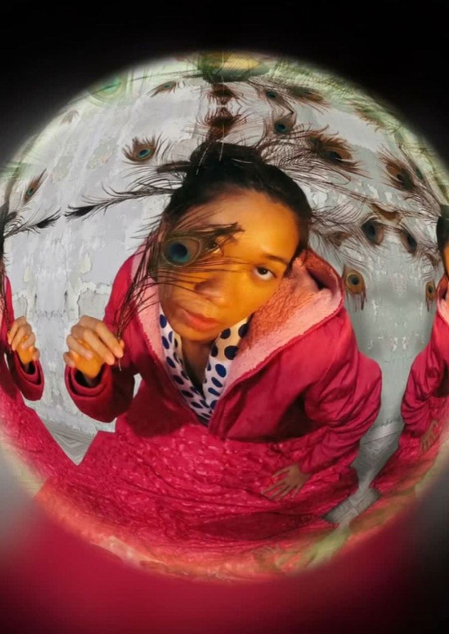 Fisheye portrait with peacock feathers