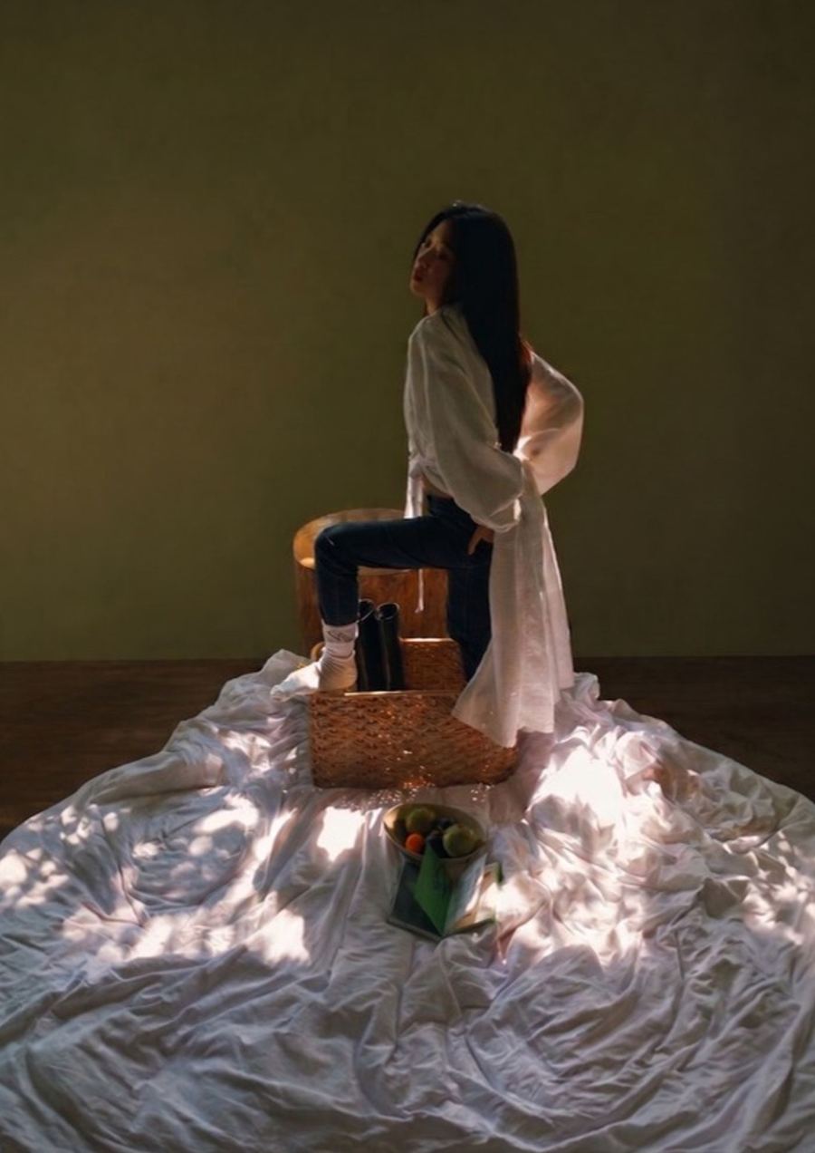 White shirt and jeans styled in afternoon light